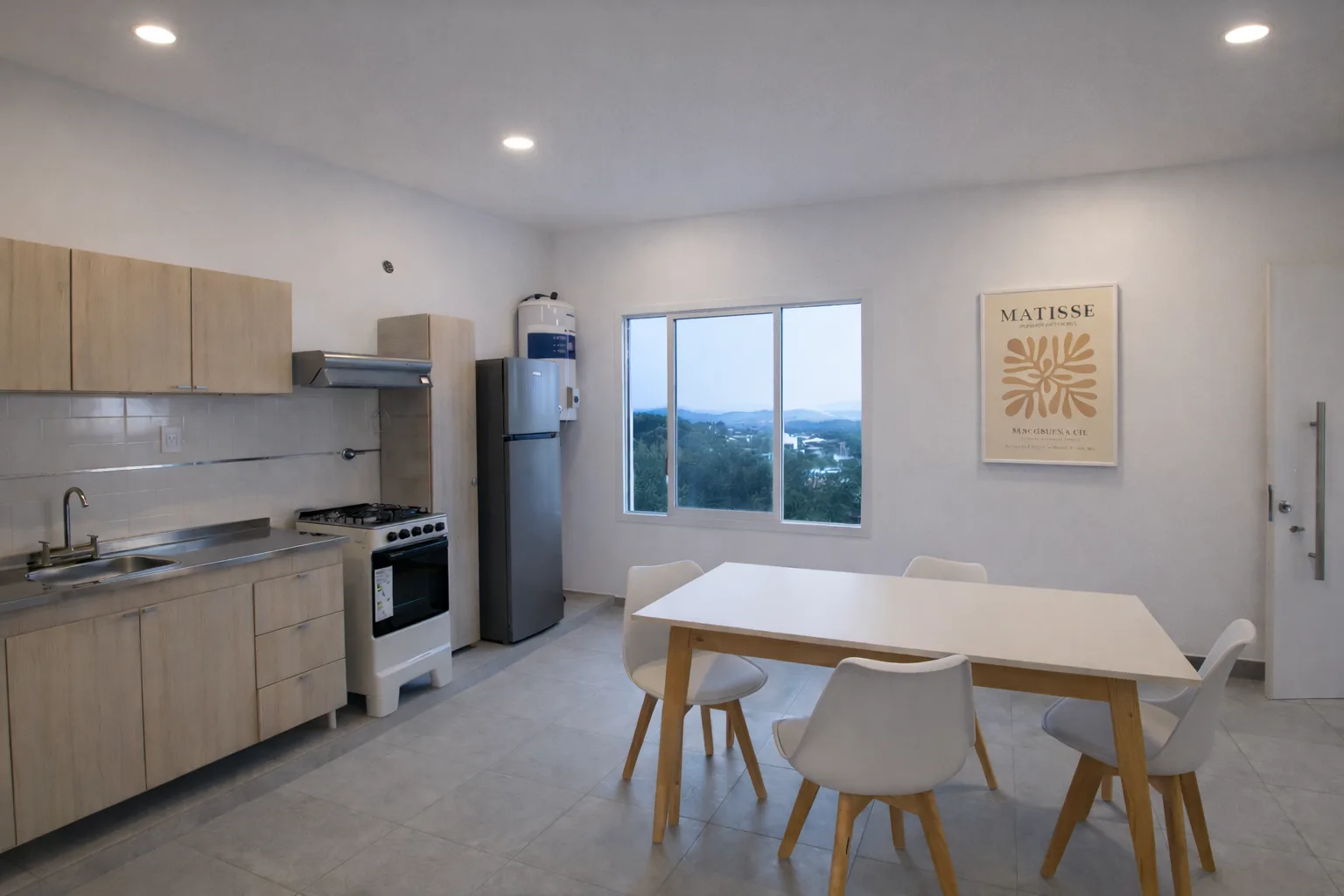 Cocina comedor integrada del alquiler temporario en Tanti